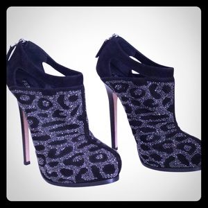 Black Fendi stiletto booties.